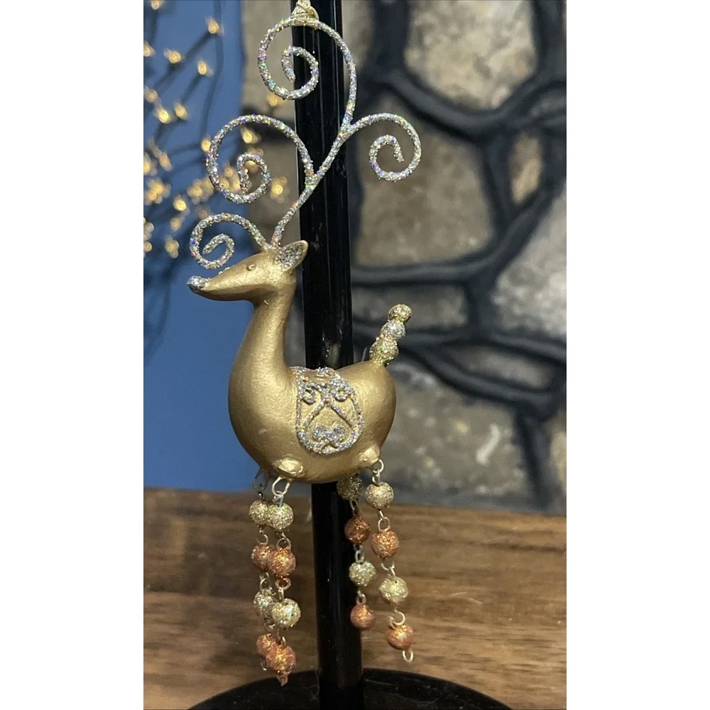 Pier 1 Reindeer Christmas ornament glittery gold style with beaded dangly legs
